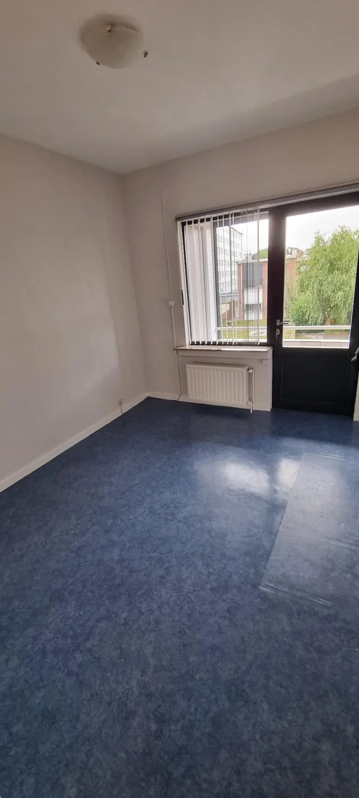 Après débarras à Ath — Appartement : pièce vidée et nettoyée