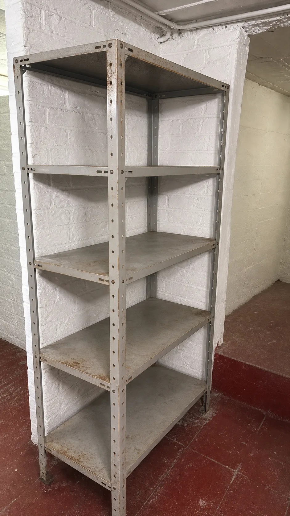 Après débarras à Kortenberg — Local de rangement débarrassé