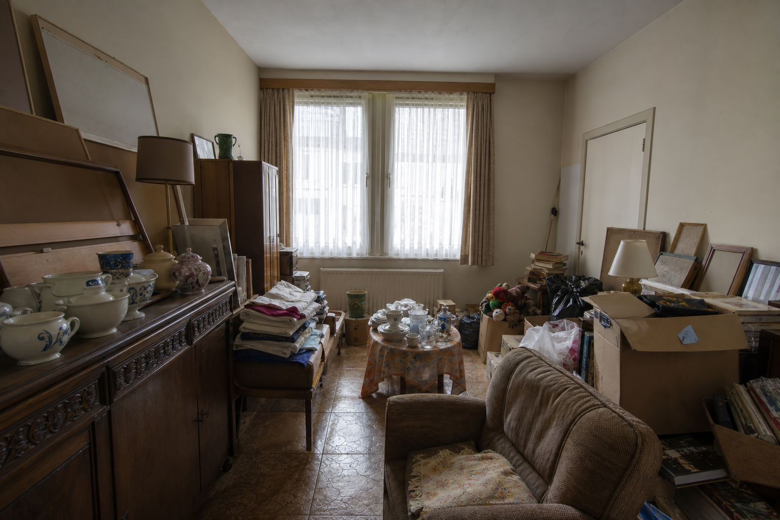 Vide maison mitoyenne à Baerle-Duc : avant, en cours et après — avant débarras