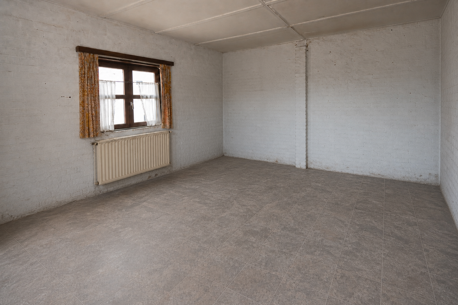 Vide garage-atelier à Begijnendijk : avant, en cours et après — après débarras