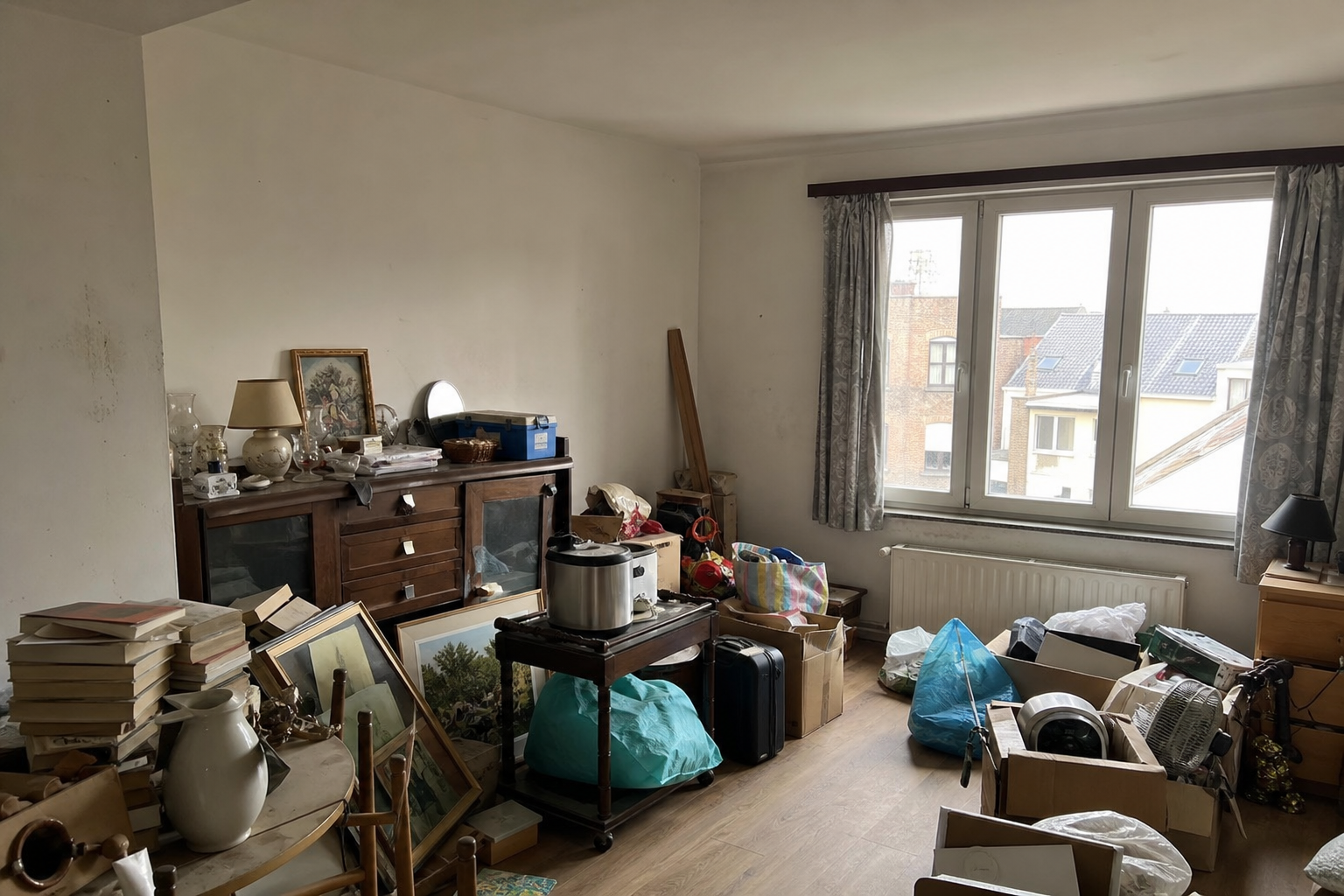Vide appartement à Boom : avant, en cours et après — avant débarras