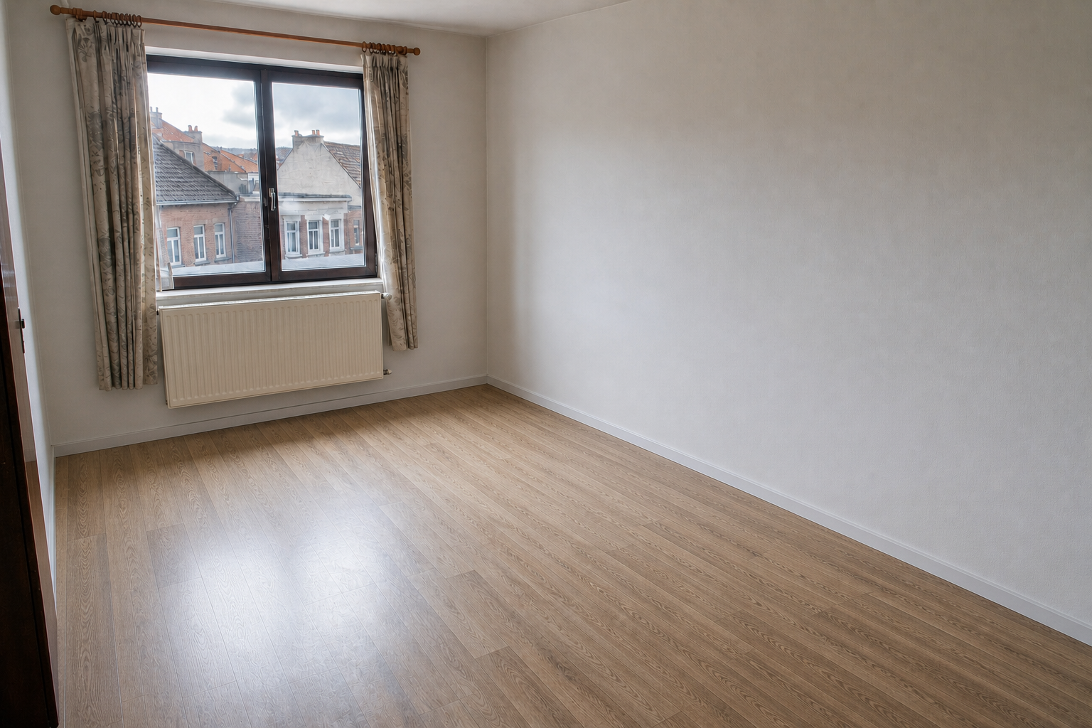 Vide appartement à Bree : avant, en cours et après — après débarras