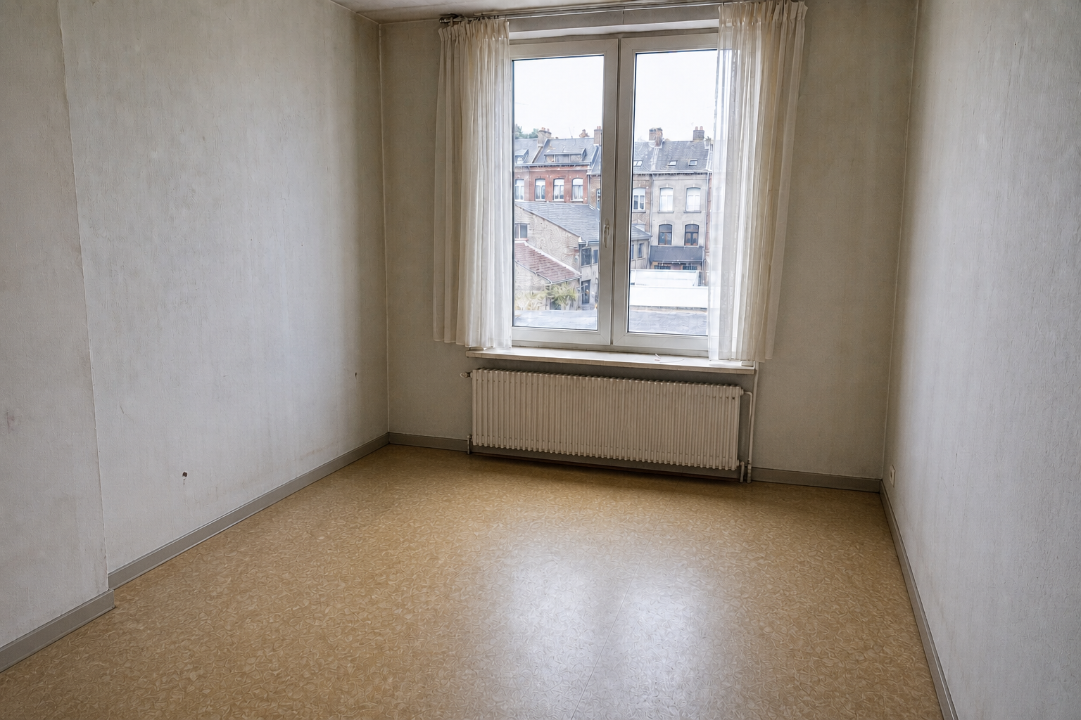 Vide appartement à Farciennes : avant, en cours et après — après débarras
