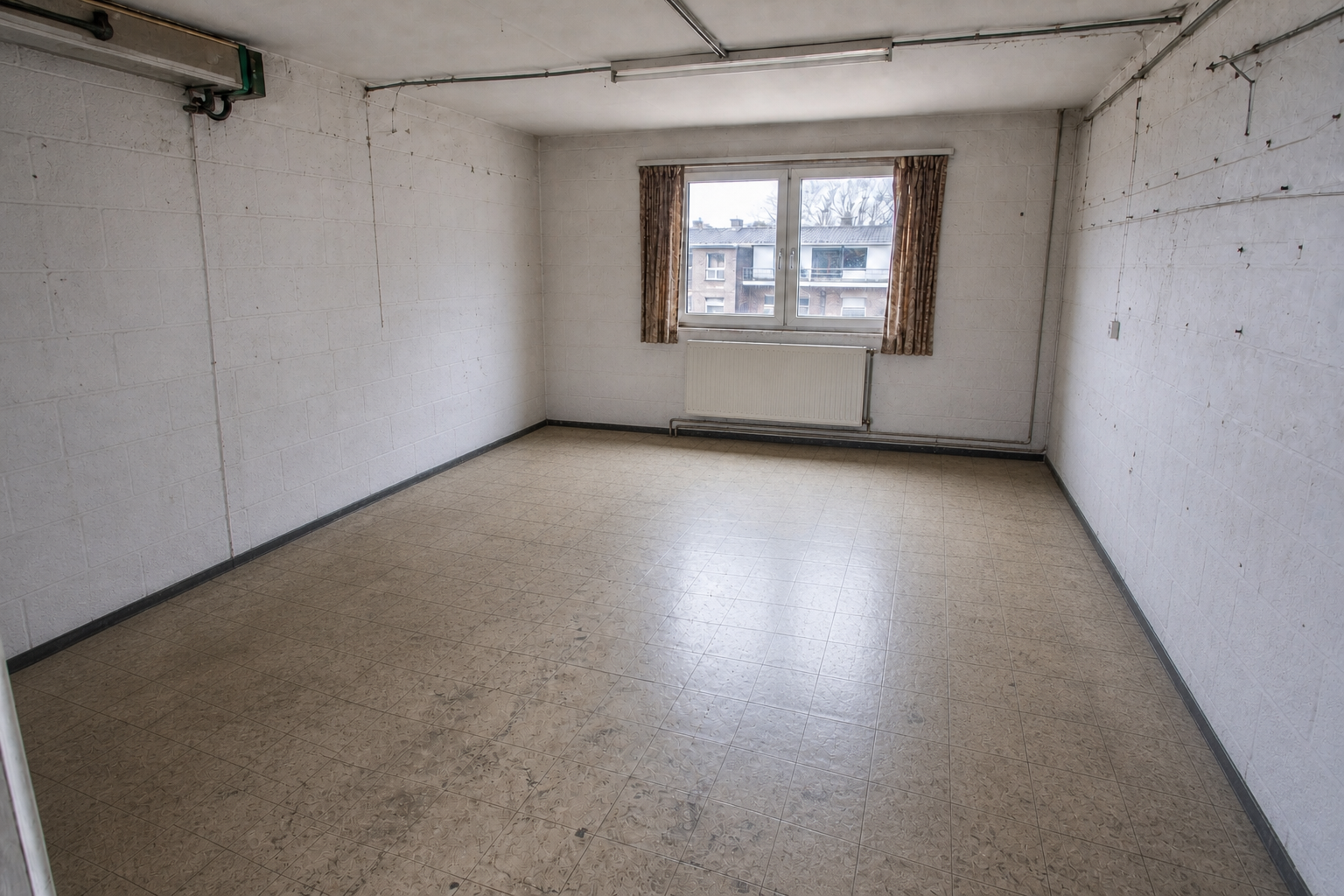Vide garage-atelier à Grâce-Hollogne : avant, en cours et après — après débarras