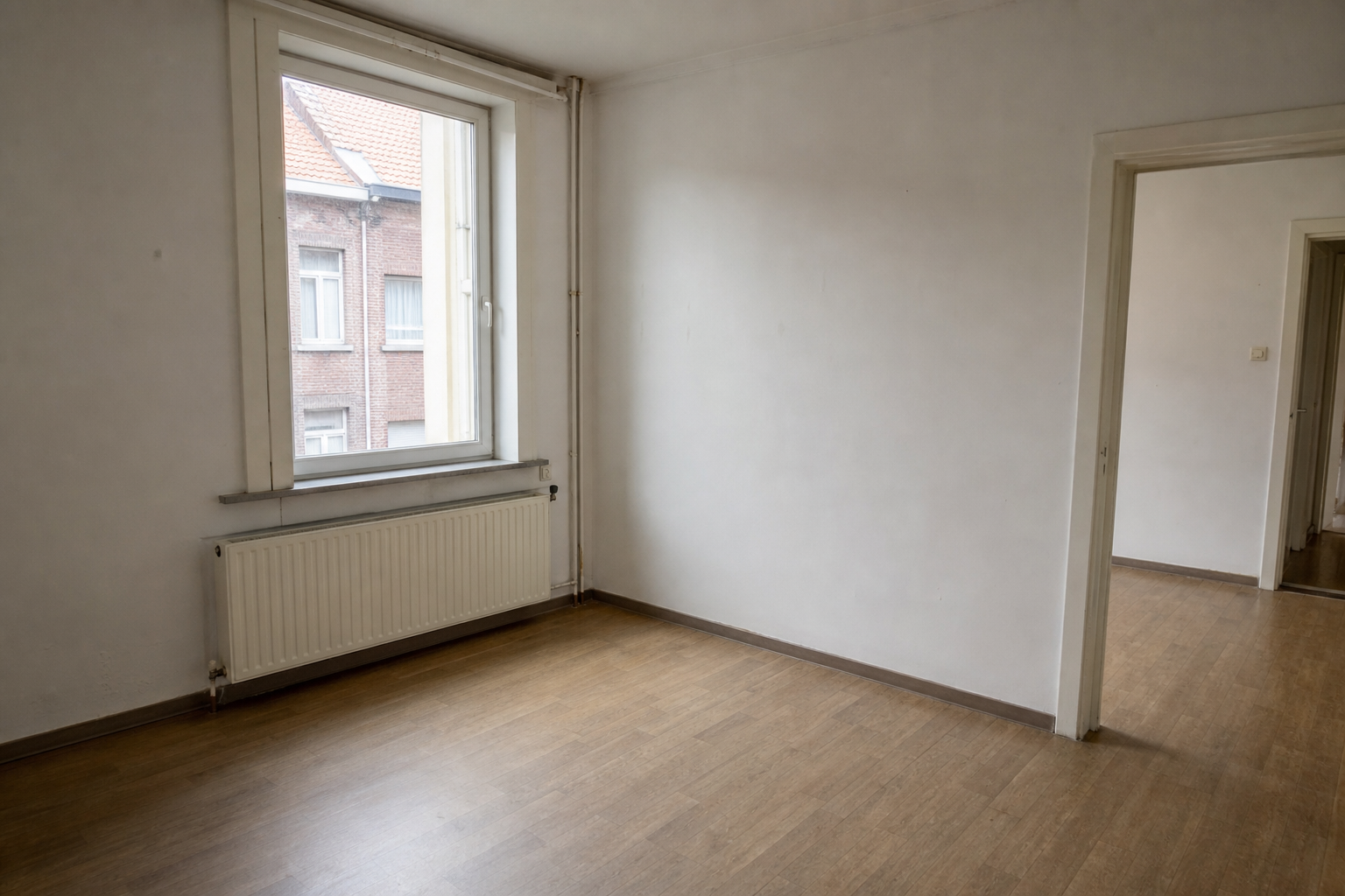 Vide maison mitoyenne en fin de bail à Kuurne : avant, en cours et après — après débarras