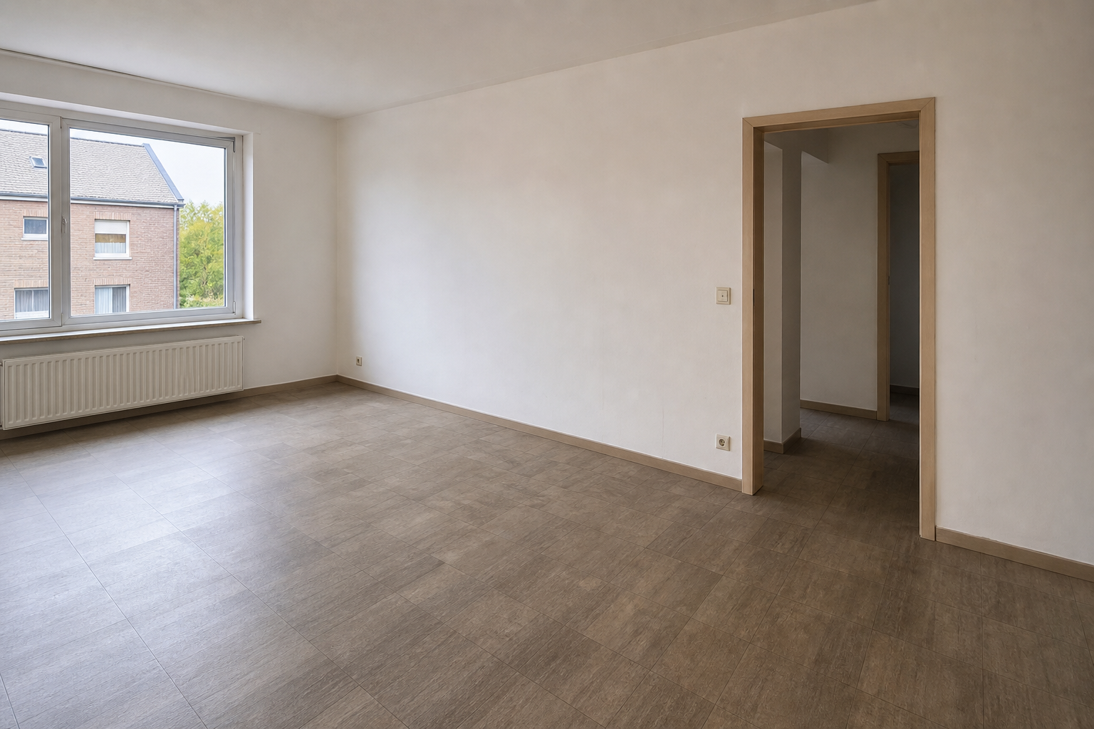 Vide appartement à Lanaken : avant, en cours et après — après débarras