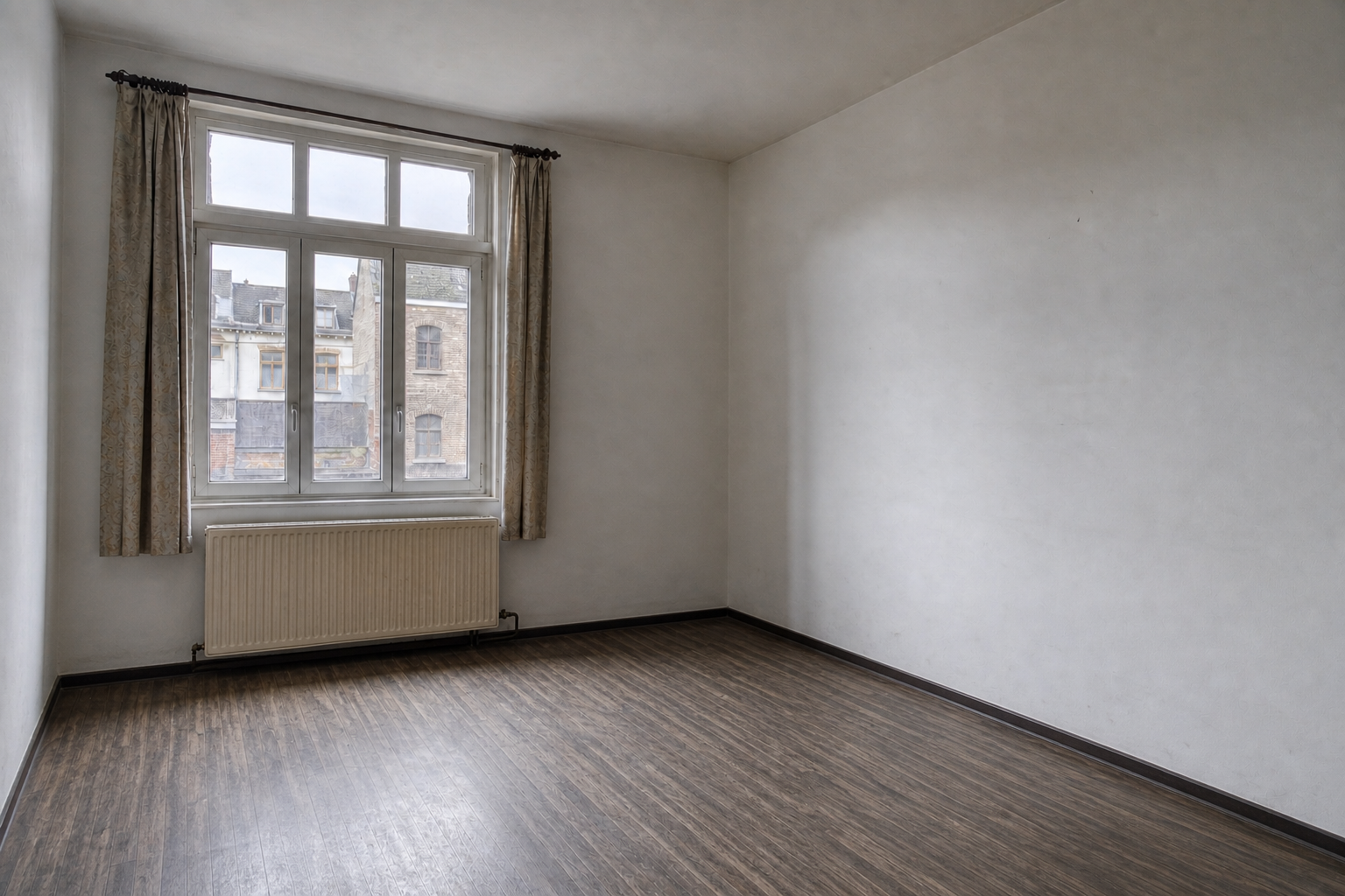 Vide appartement en centre-ville à Malmedy : avant, en cours et après — après débarras