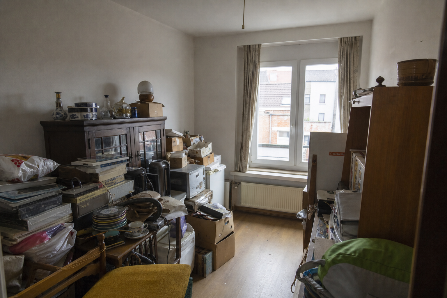 Vide appartement à Peer : avant, en cours et après — avant débarras