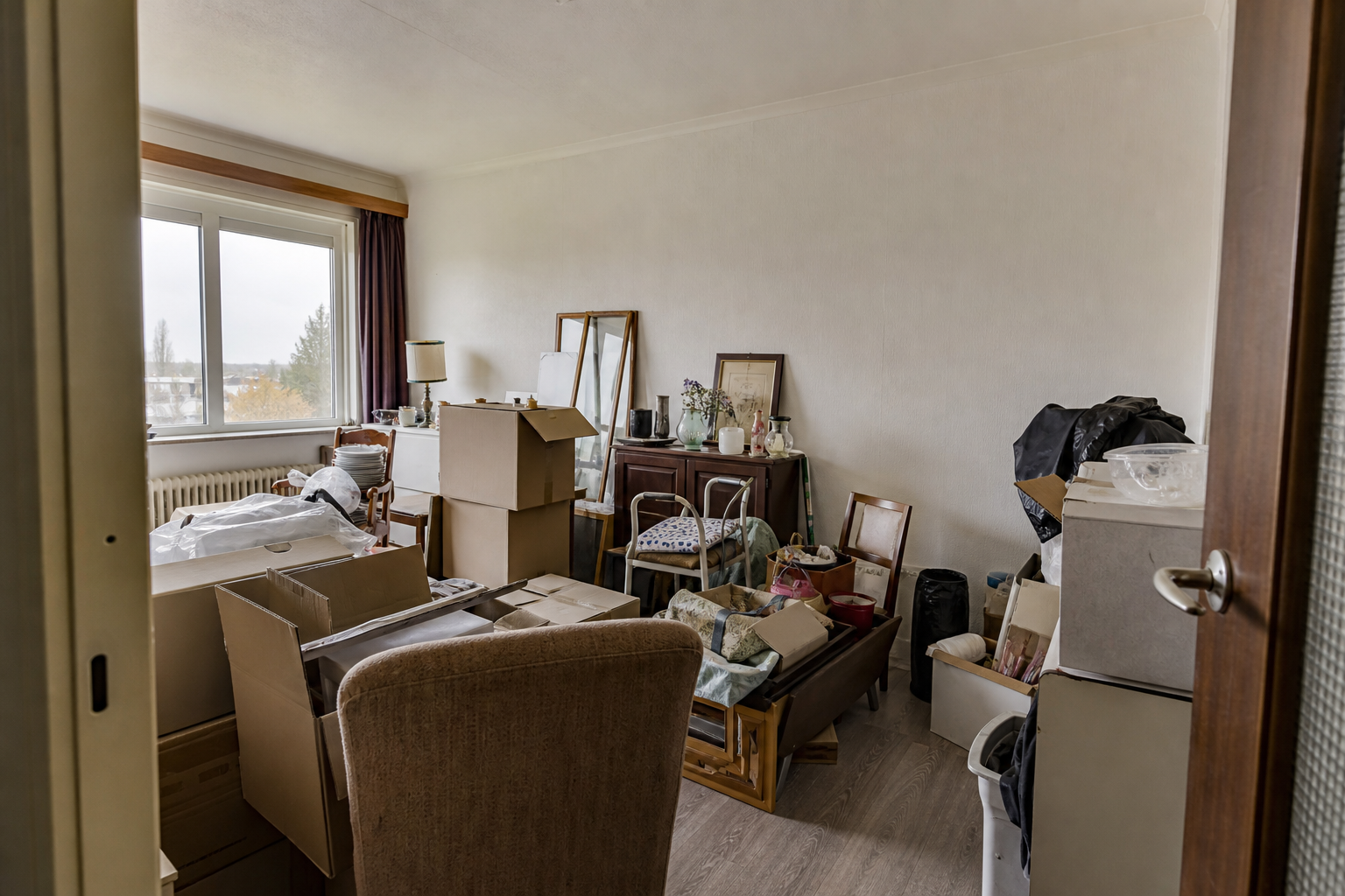 Vide appartement à Torhout : avant, en cours et après — avant débarras