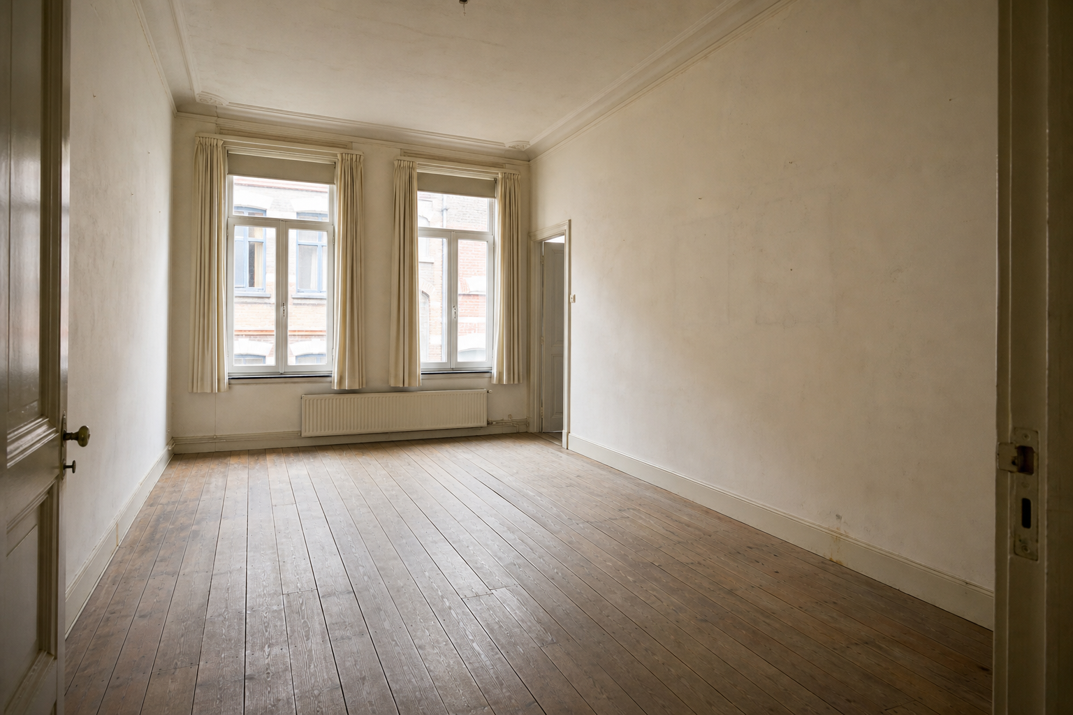 Vide maison de ville à Furnes : avant, en cours et après — après débarras
