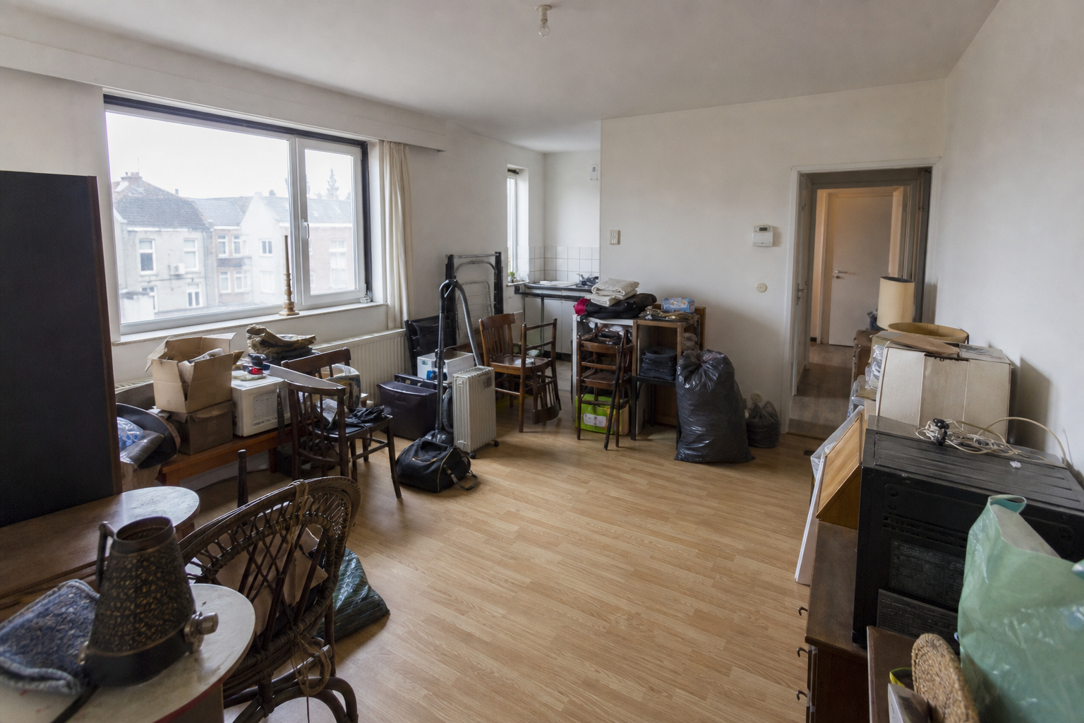Vide appartement après départ à Waregem : avant, en cours et après — avant débarras