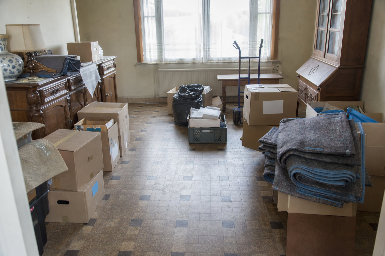 Débarras après départ en maison de repos à Zottegem : avant, en cours et après — intervention en cours